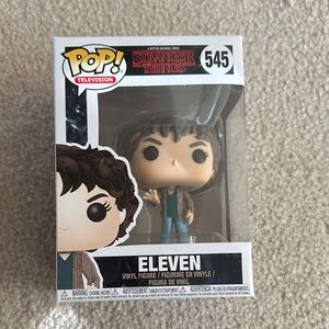 Funko Pop Eleven Figure with Brown Hair and Blue Outfit